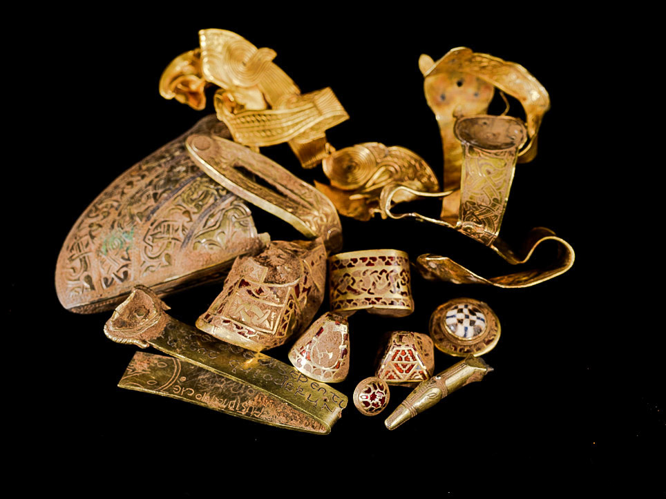 Annotated selection of Staffordshire Hoard gold and garnet fittings.
