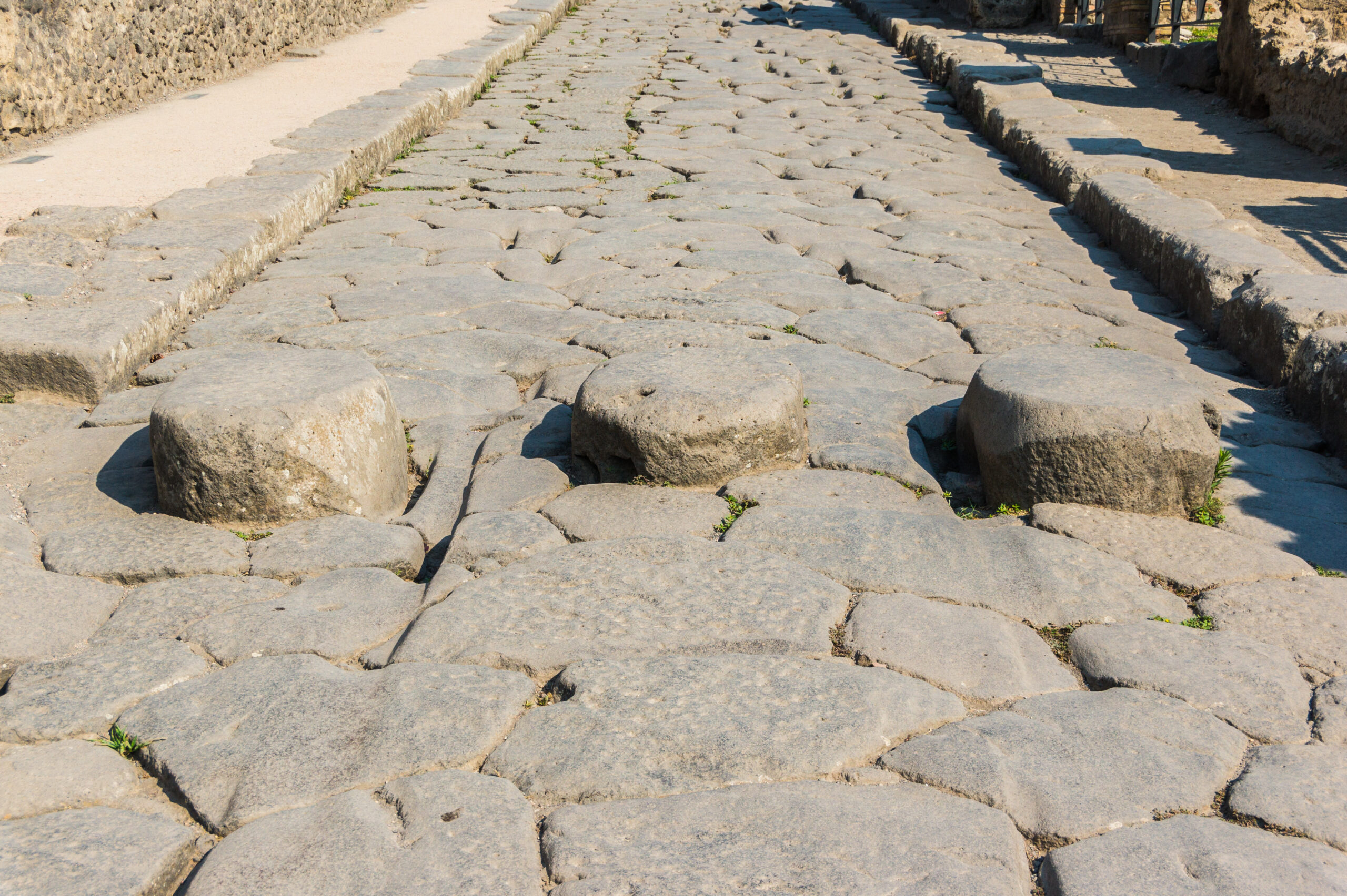 Ancient street and stepping stones at Pompeii, photographed in 2015